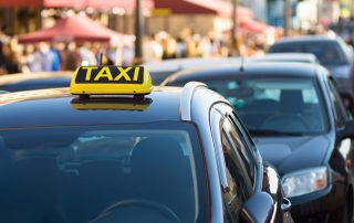 symbol or sign of taxi on a car roof